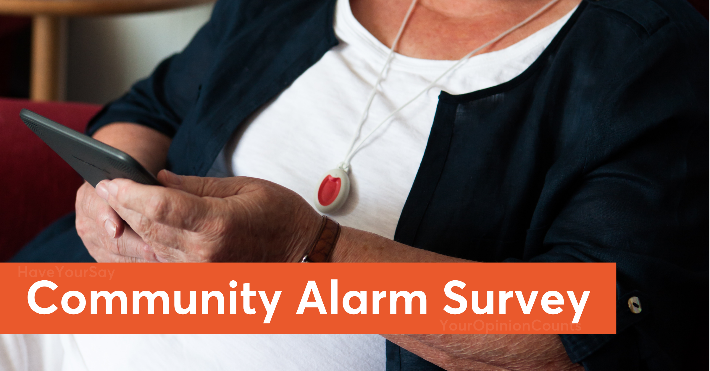 Woman wearing community alarm pendant